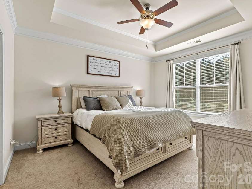 4222 Millstream Road, Denver, NC 28037.  MLS# CAR4341138, YatesRealty ID 5435. Primary suite with tray ceiling and ceiling fan