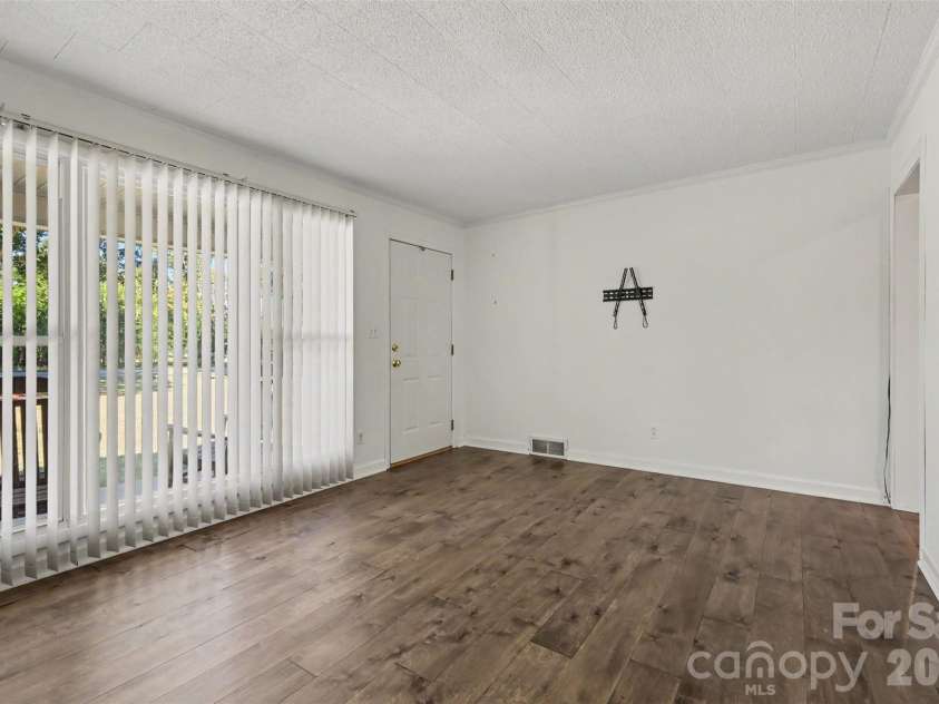 1555 Hess Road, Concord, NC 28025.  MLS# CAR4409569, YatesRealty ID 54352. Living Room
