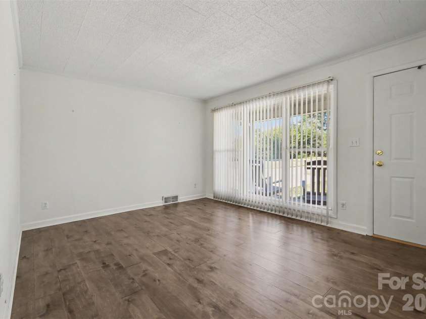 1555 Hess Road, Concord, NC 28025.  MLS# CAR4409569, YatesRealty ID 54352. Living Room