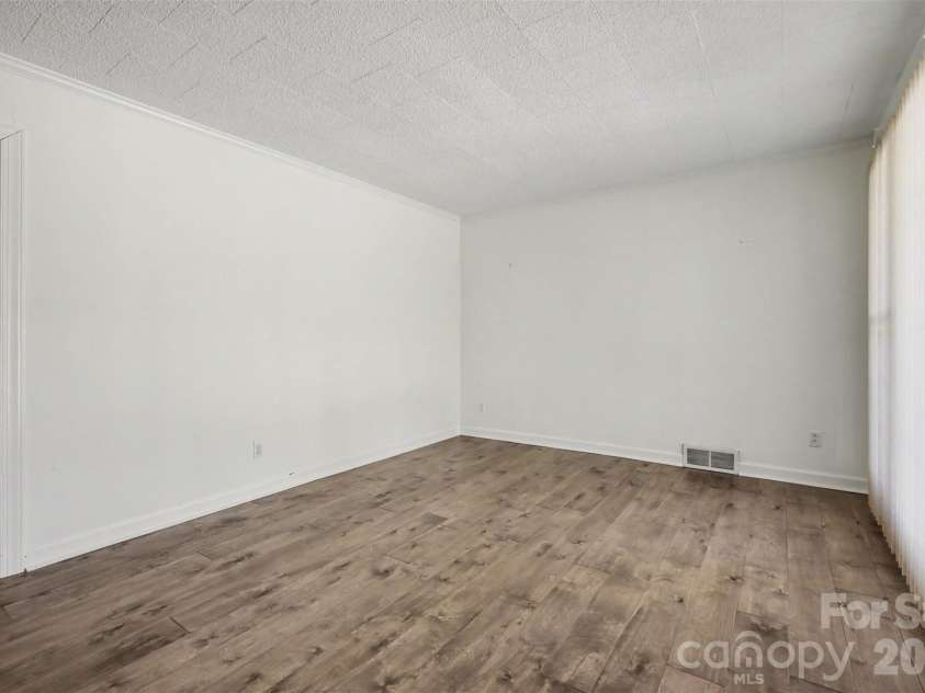 1555 Hess Road, Concord, NC 28025.  MLS# CAR4409569, YatesRealty ID 54352. Living Room