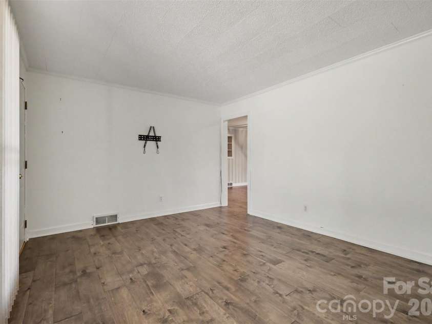1555 Hess Road, Concord, NC 28025.  MLS# CAR4409569, YatesRealty ID 54352. Living Room