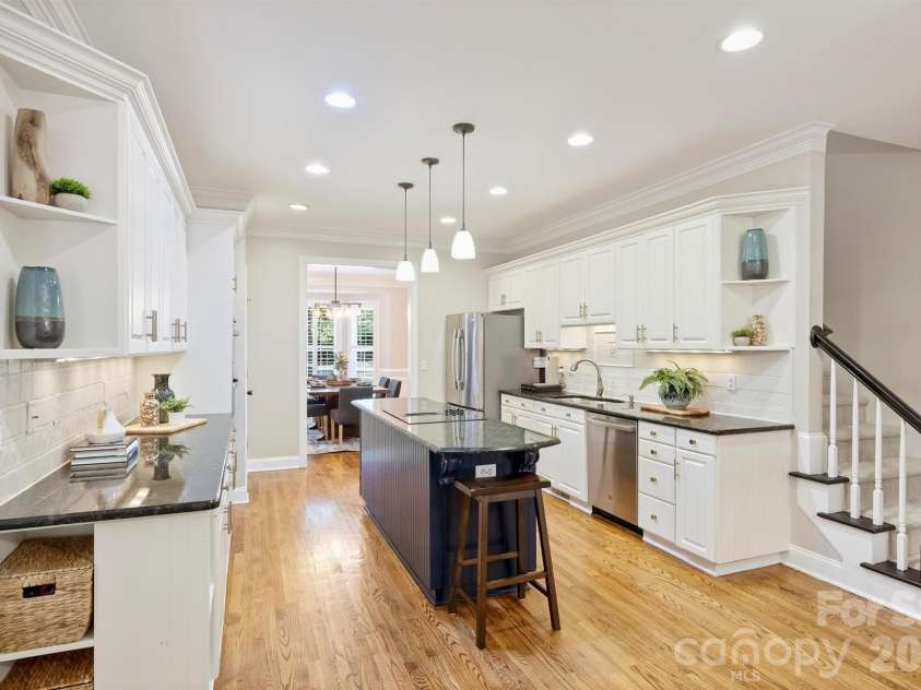 12727 Duncourtney Lane, Charlotte, NC 28277.  MLS# CAR4427559, YatesRealty ID 54365. Gourmet kitchen with island