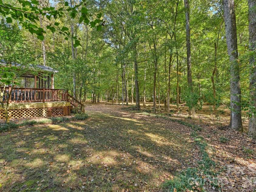 12727 Duncourtney Lane, Charlotte, NC 28277.  MLS# CAR4427559, YatesRealty ID 54365. Private wooded backyard