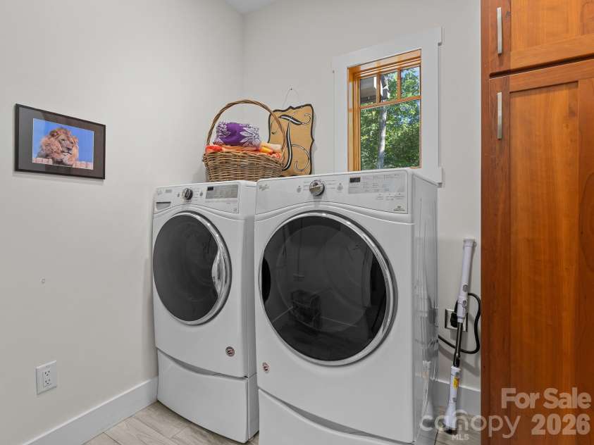 359 New Castle Road, Brevard, NC 28712.  MLS# CAR4427485, YatesRealty ID 54367. Good size laundry room with added storage