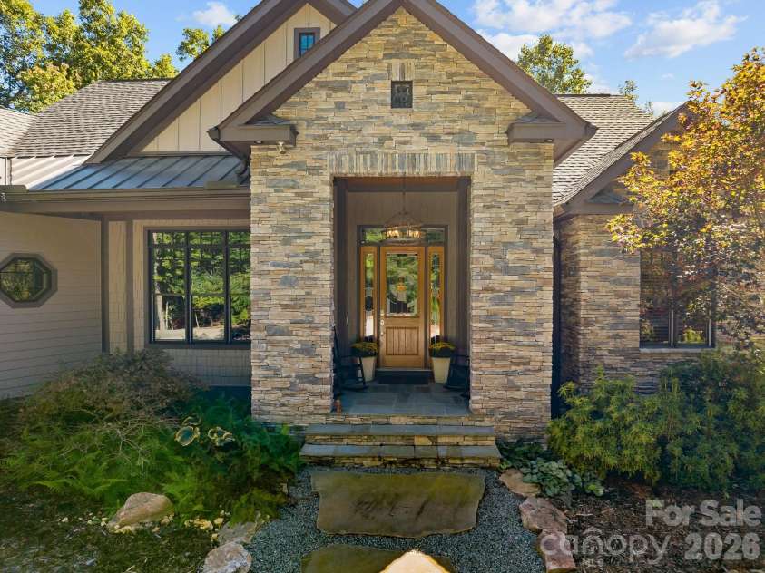 359 New Castle Road, Brevard, NC 28712.  MLS# CAR4427485, YatesRealty ID 54367. Stacked stone front adds texture and depth