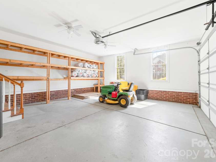 4014 Belle Meade Circle, Belmont, NC 28012.  MLS# CAR4429750, YatesRealty ID 54372. 2 car garage with storage shelves