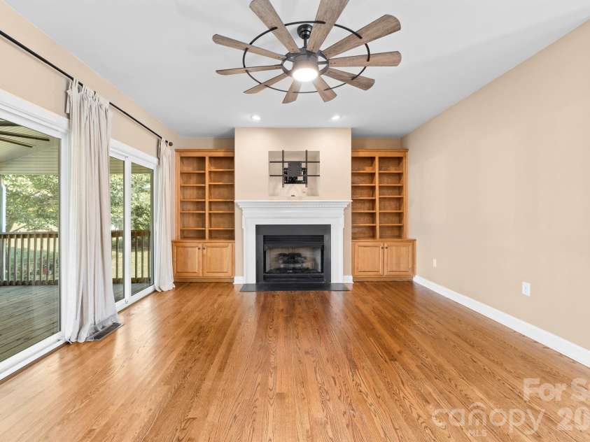 4014 Belle Meade Circle, Belmont, NC 28012.  MLS# CAR4429750, YatesRealty ID 54372. Built ins and gas fireplace