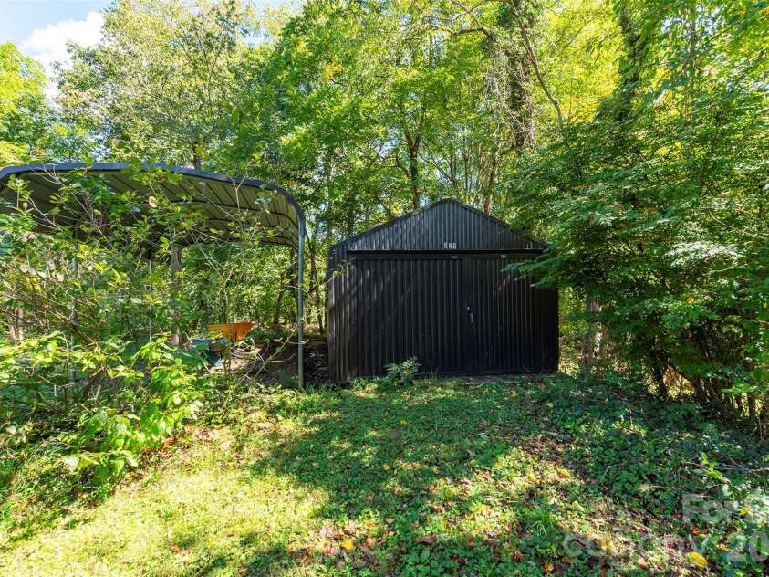 824 Cherokee Avenue, Black Mountain, NC 28711.  MLS# CAR4430479, YatesRealty ID 54382. 12x24 ft Storage Building newly repainted