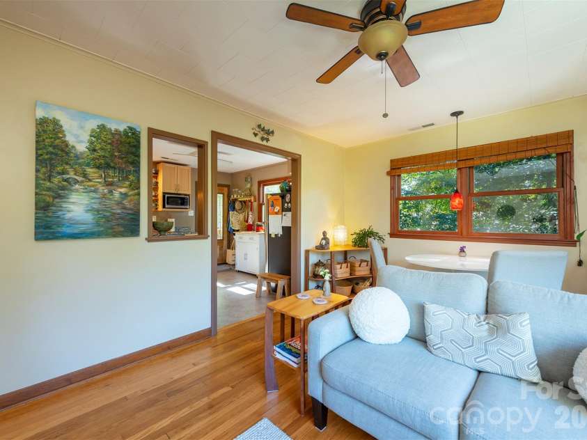 824 Cherokee Avenue, Black Mountain, NC 28711.  MLS# CAR4430479, YatesRealty ID 54382. Light filled living room and dining area
