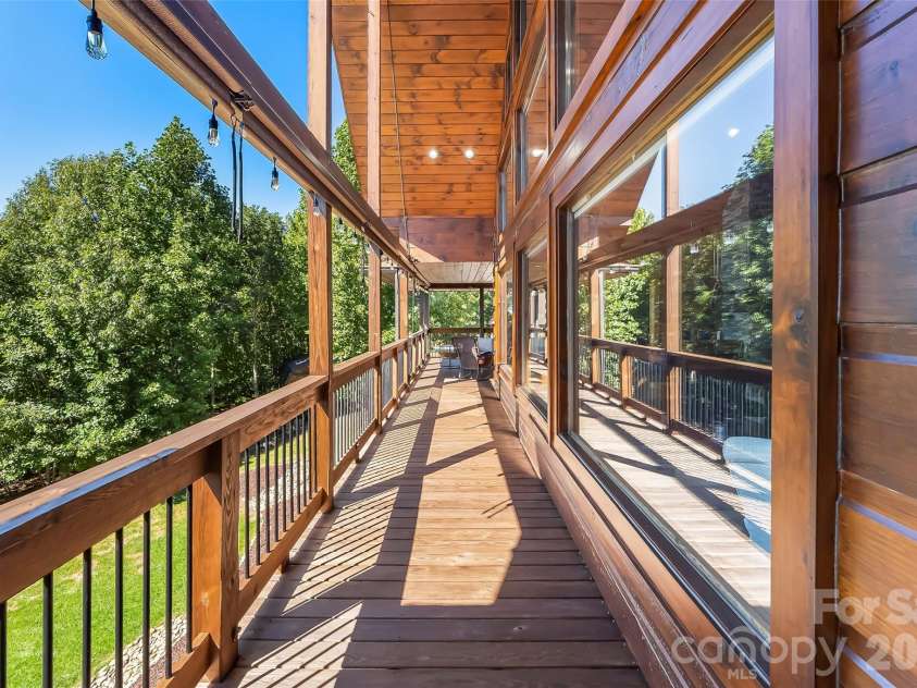 1853 Grandview Drive, Nebo, NC 28761.  MLS# CAR4430232, YatesRealty ID 54383. Wrap around porch