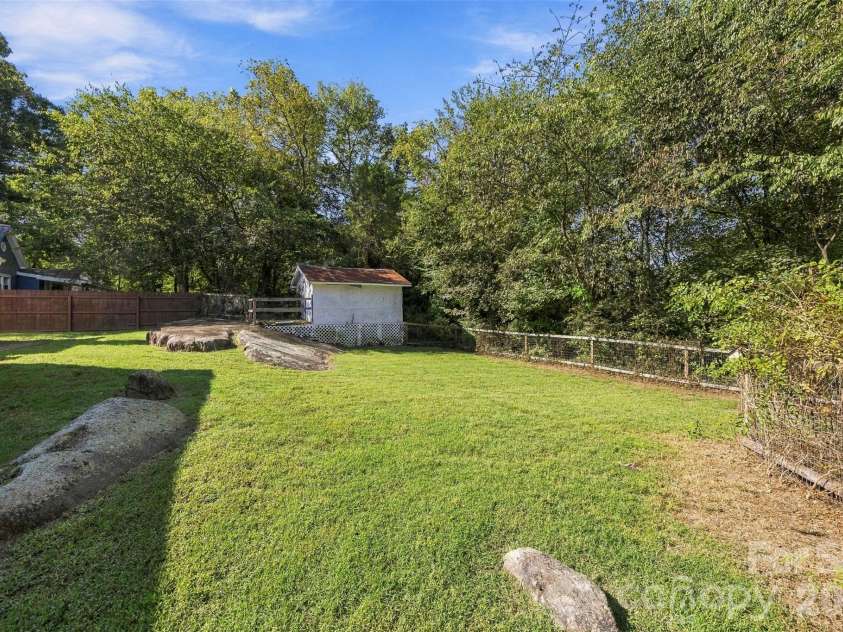 119 Walton Street, Granite Quarry, NC 28072.  MLS# CAR4425481, YatesRealty ID 54394. Fenced in back yard