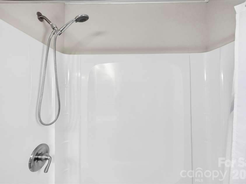 119 Walton Street, Granite Quarry, NC 28072.  MLS# CAR4425481, YatesRealty ID 54394. Hall bath shower