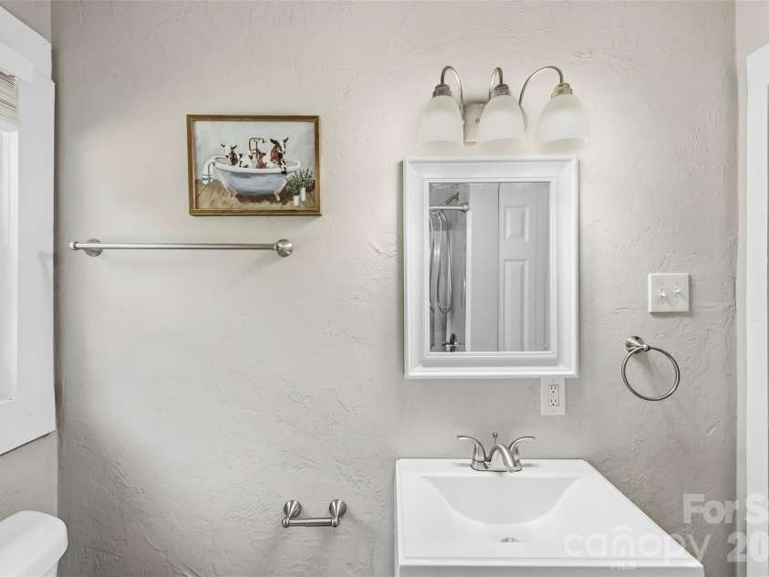 119 Walton Street, Granite Quarry, NC 28072.  MLS# CAR4425481, YatesRealty ID 54394. Hall bathroom