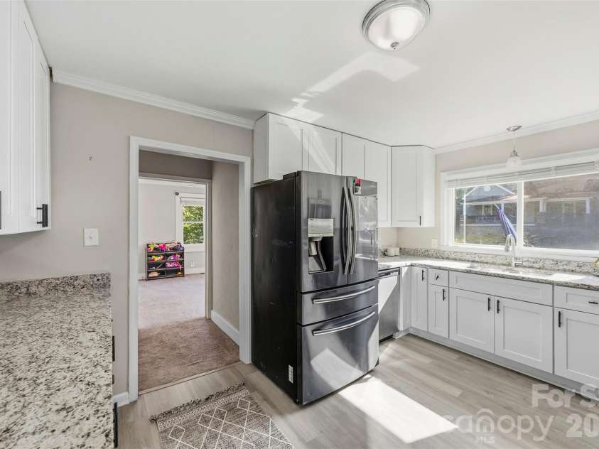 119 Walton Street, Granite Quarry, NC 28072.  MLS# CAR4425481, YatesRealty ID 54394. Kitchen with large kitchen window over the sink