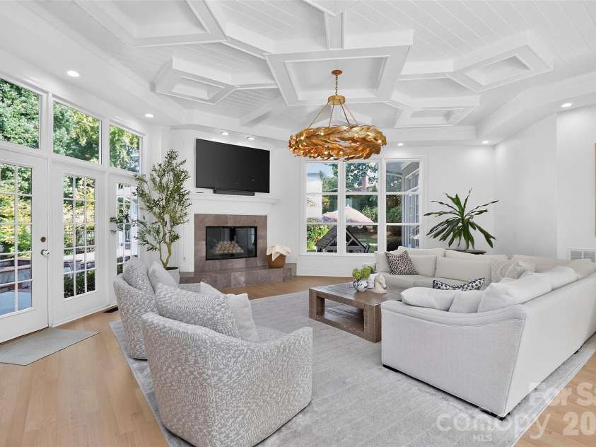 1901 Cortelyou Road, Charlotte, NC 28211.  MLS# CAR4421734, YatesRealty ID 54400. Den with walkouts to pool
