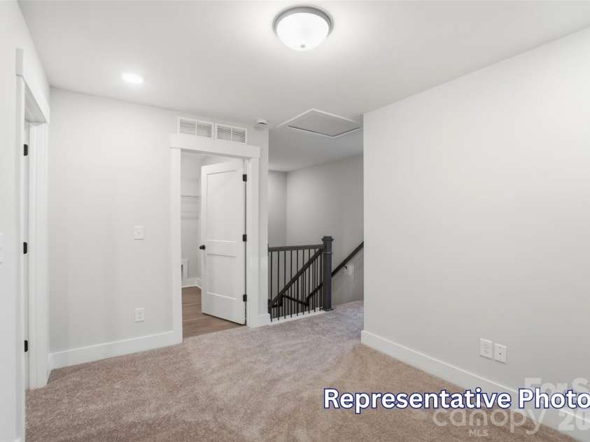 410 Blythe Townhome Lane, Waxhaw, NC 28173.  MLS# CAR4414936, YatesRealty ID 54401. Loft
