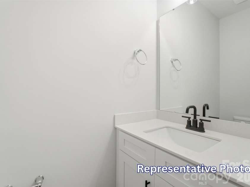 410 Blythe Townhome Lane, Waxhaw, NC 28173.  MLS# CAR4414936, YatesRealty ID 54401. Powder Bath