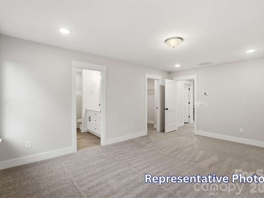 410 Blythe Townhome Lane, Waxhaw, NC 28173.  MLS# CAR4414936, YatesRealty ID 54401. Primary Bedroom