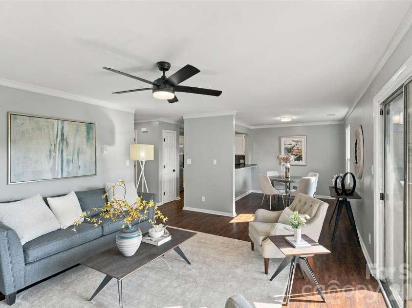 762 Marsh Road, Charlotte, NC 28209.  MLS# CAR4340120, YatesRealty ID 54407. Bright living room with direct access to the private balcony