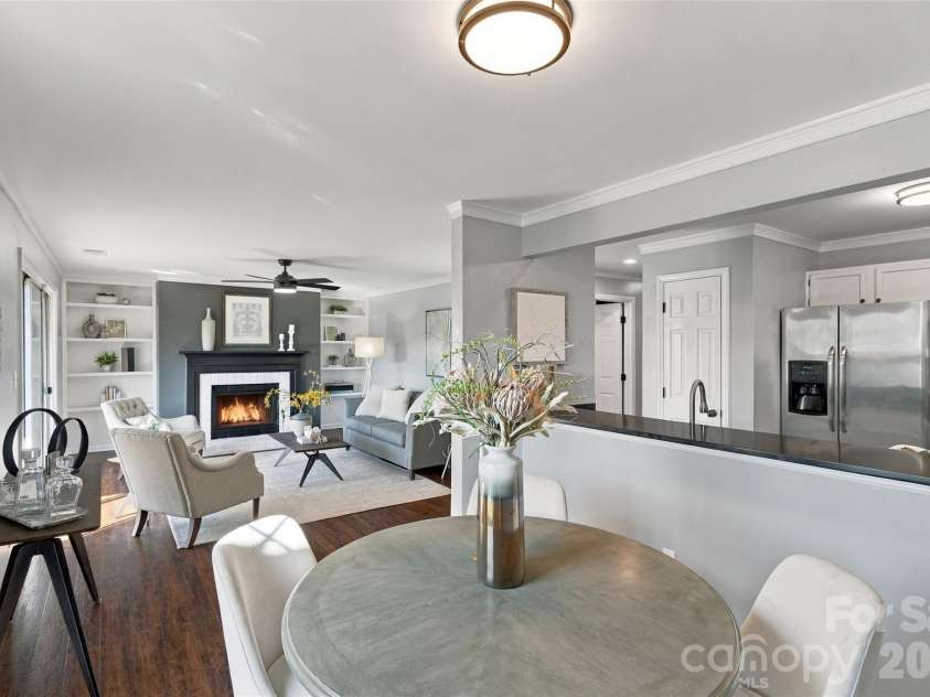 762 Marsh Road, Charlotte, NC 28209.  MLS# CAR4340120, YatesRealty ID 54407. Open layout connects the kitchen, dining area and living room