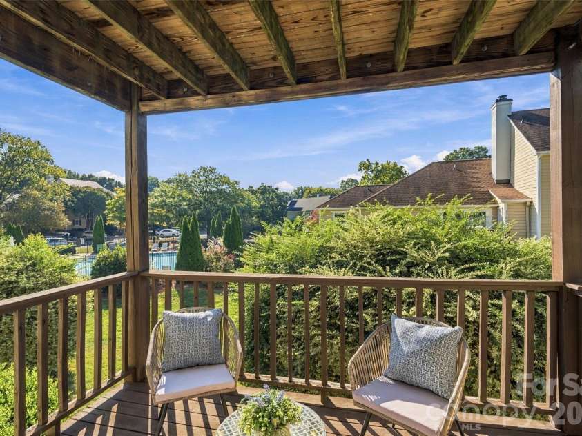 762 Marsh Road, Charlotte, NC 28209.  MLS# CAR4340120, YatesRealty ID 54407. Private covered balcony extends the living space outdoors