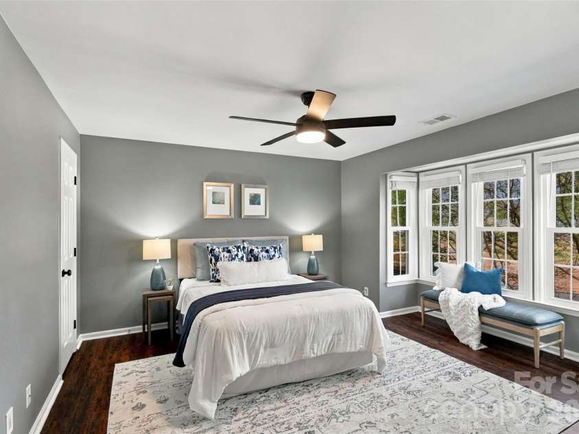 762 Marsh Road, Charlotte, NC 28209.  MLS# CAR4340120, YatesRealty ID 54407. Spacious primary bedroom with ceiling fan and abundant natural light