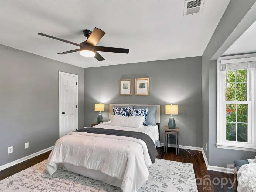 762 Marsh Road, Charlotte, NC 28209.  MLS# CAR4340120, YatesRealty ID 54407. Spacious primary bedroom with ceiling fan and abundant natural light