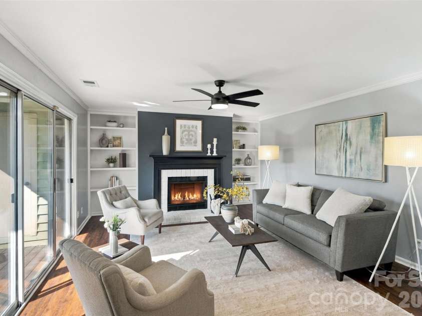 762 Marsh Road, Charlotte, NC 28209.  MLS# CAR4340120, YatesRealty ID 54407. Wood-burning fireplace framed by built-in shelving