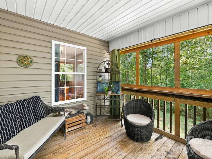 8 Maltese Lane, Weaverville, NC 28787.  MLS# CAR4430513, YatesRealty ID 54416. Screen porch off the kitchen.