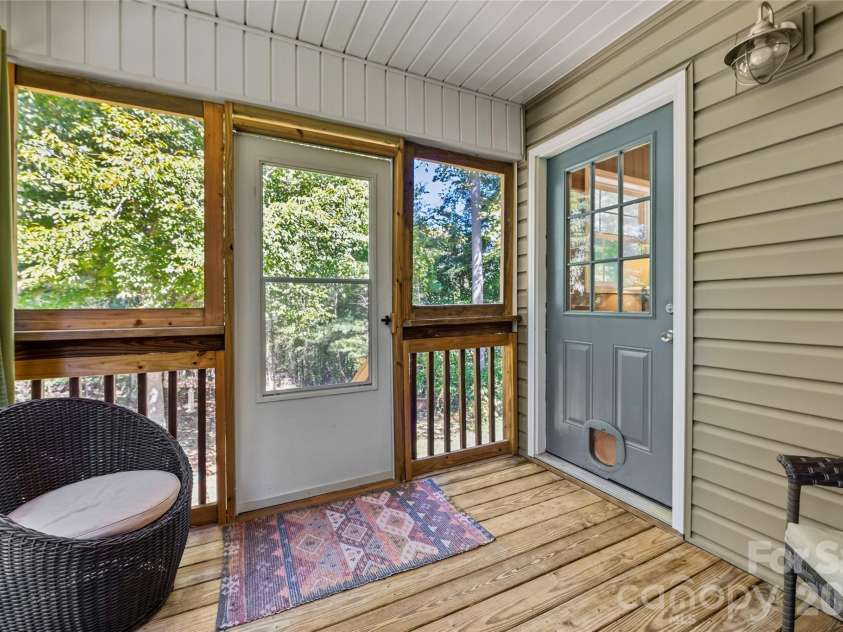 8 Maltese Lane, Weaverville, NC 28787.  MLS# CAR4430513, YatesRealty ID 54416. Screen porch to the backyard.