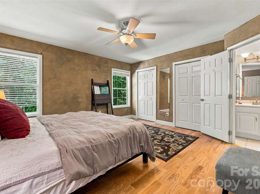 8 Maltese Lane, Weaverville, NC 28787.  MLS# CAR4430513, YatesRealty ID 54416. Two clothes in the primary.