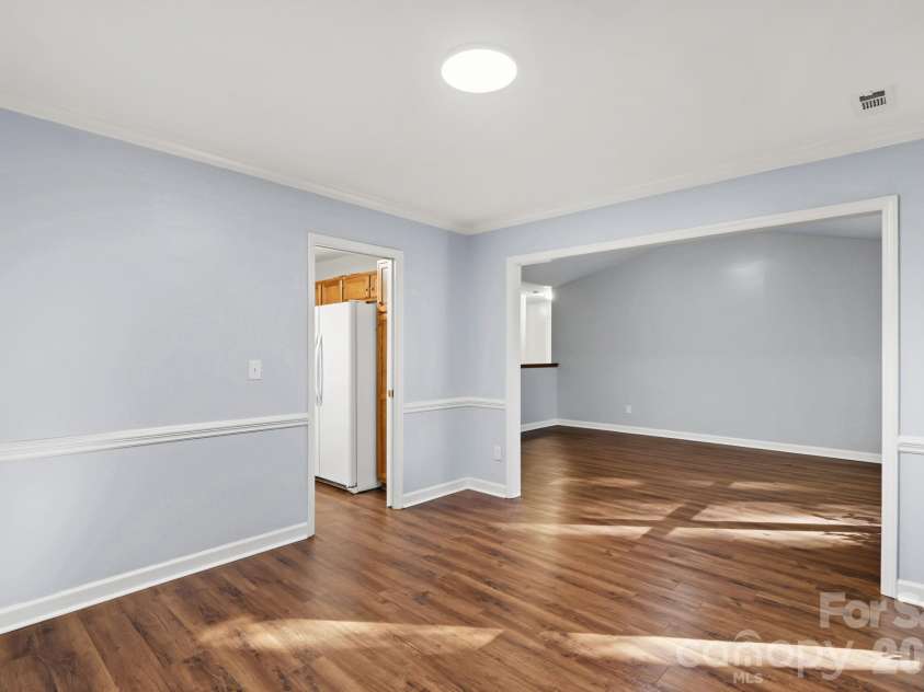 13820 Portpatrick Lane, Matthews, NC 28105.  MLS# CAR4427507, YatesRealty ID 54428. A look back at the kitchen