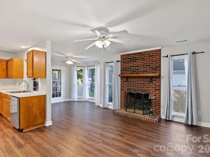 13820 Portpatrick Lane, Matthews, NC 28105.  MLS# CAR4427507, YatesRealty ID 54428. Kitchen and living area
