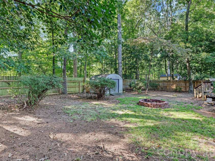 13820 Portpatrick Lane, Matthews, NC 28105.  MLS# CAR4427507, YatesRealty ID 54428. Outside area/backyard