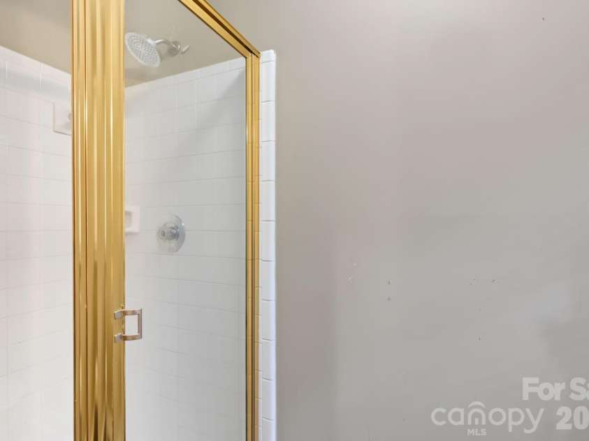13820 Portpatrick Lane, Matthews, NC 28105.  MLS# CAR4427507, YatesRealty ID 54428. Primary Bathroom walk in shower