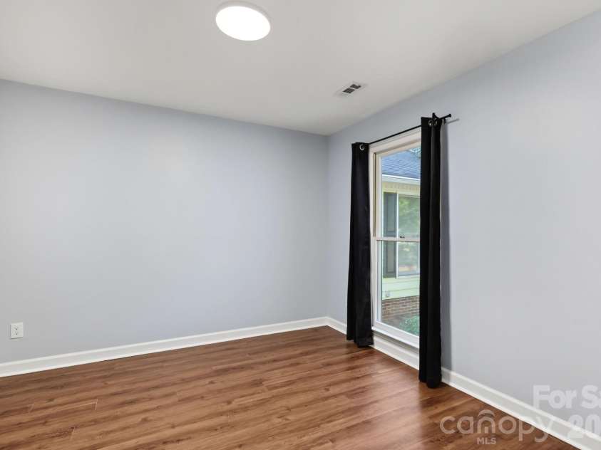 13820 Portpatrick Lane, Matthews, NC 28105.  MLS# CAR4427507, YatesRealty ID 54428. Secondary Bedroom
