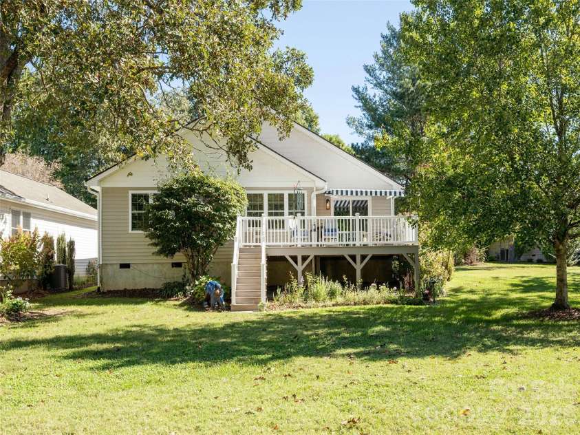 277 Highland Golf Drive, Flat Rock, NC 28731.  MLS# CAR4430345, YatesRealty ID 54429. Ample yard space.