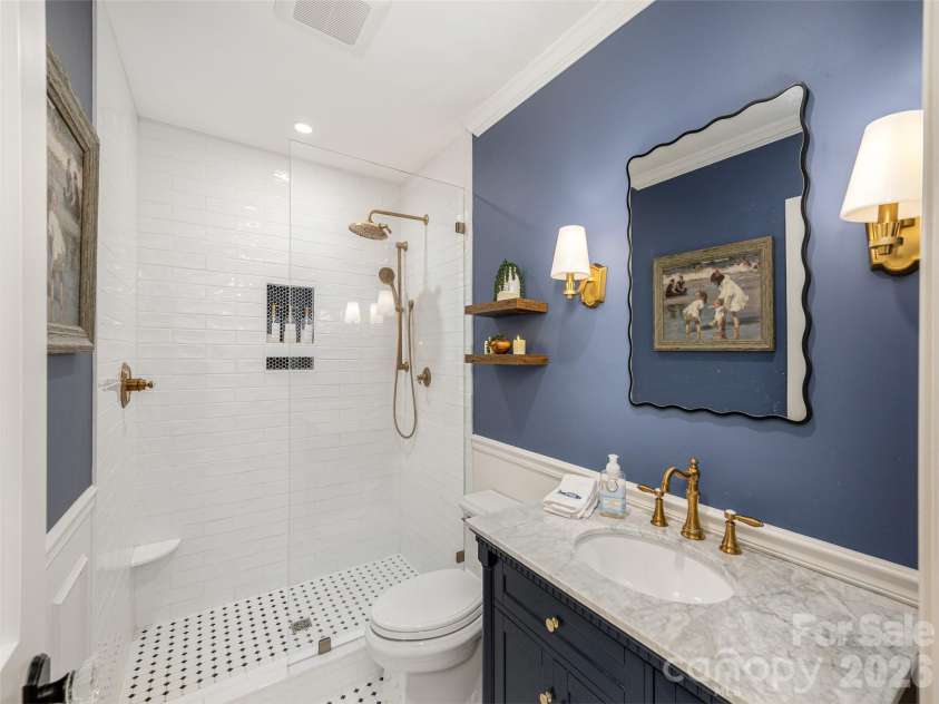 277 Highland Golf Drive, Flat Rock, NC 28731.  MLS# CAR4430345, YatesRealty ID 54429. Beautiful second bath with easy step-in shower.