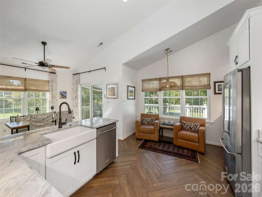 277 Highland Golf Drive, Flat Rock, NC 28731.  MLS# CAR4430345, YatesRealty ID 54429. Cozy kitchen sitting area.