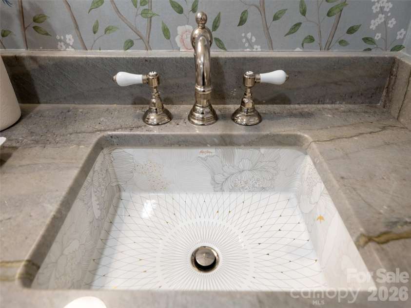 277 Highland Golf Drive, Flat Rock, NC 28731.  MLS# CAR4430345, YatesRealty ID 54429. High end matching double sinks in primary bath.