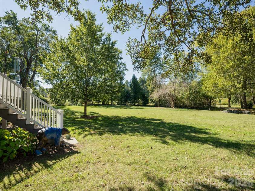 277 Highland Golf Drive, Flat Rock, NC 28731.  MLS# CAR4430345, YatesRealty ID 54429. Spacious rear yard.