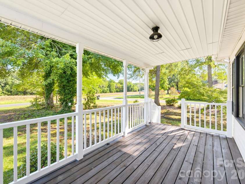 28159 Poplins Grove Church Road, Albemarle, NC 28001.  MLS# CAR4430676, YatesRealty ID 54439. Front porch
