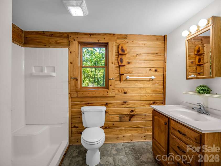 124 Starling Lane, Lake Lure, NC 28746.  MLS# CAR4430565, YatesRealty ID 54465. Main level BA