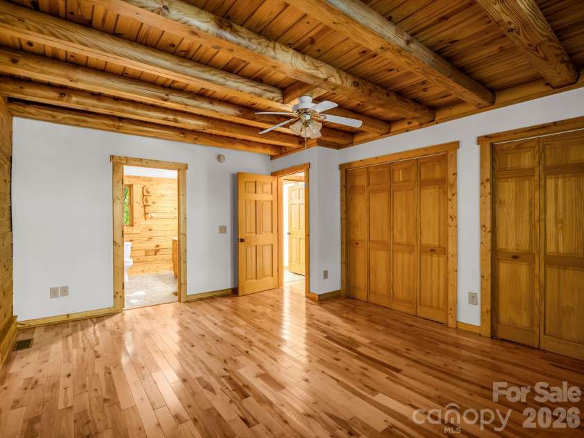 124 Starling Lane, Lake Lure, NC 28746.  MLS# CAR4430565, YatesRealty ID 54465. Main level BR w/ensuite