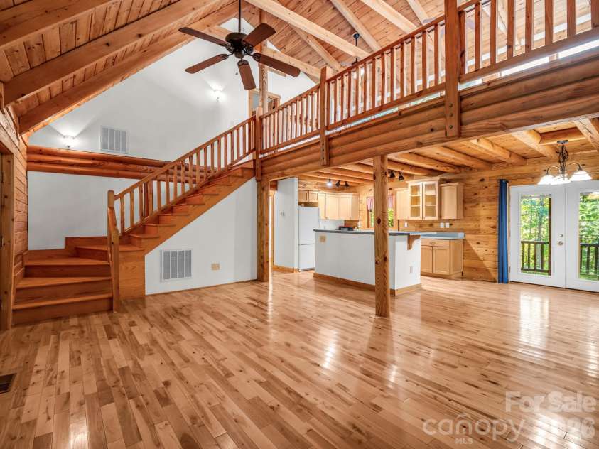 124 Starling Lane, Lake Lure, NC 28746.  MLS# CAR4430565, YatesRealty ID 54465. Open concept LR/KIT/Loft