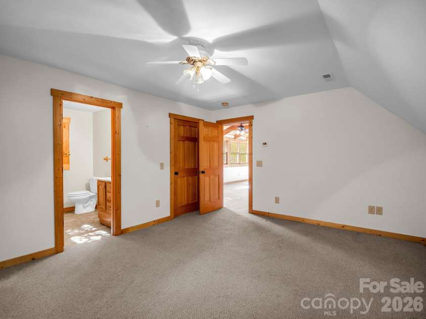 124 Starling Lane, Lake Lure, NC 28746.  MLS# CAR4430565, YatesRealty ID 54465. Upper level BR showing ensuite