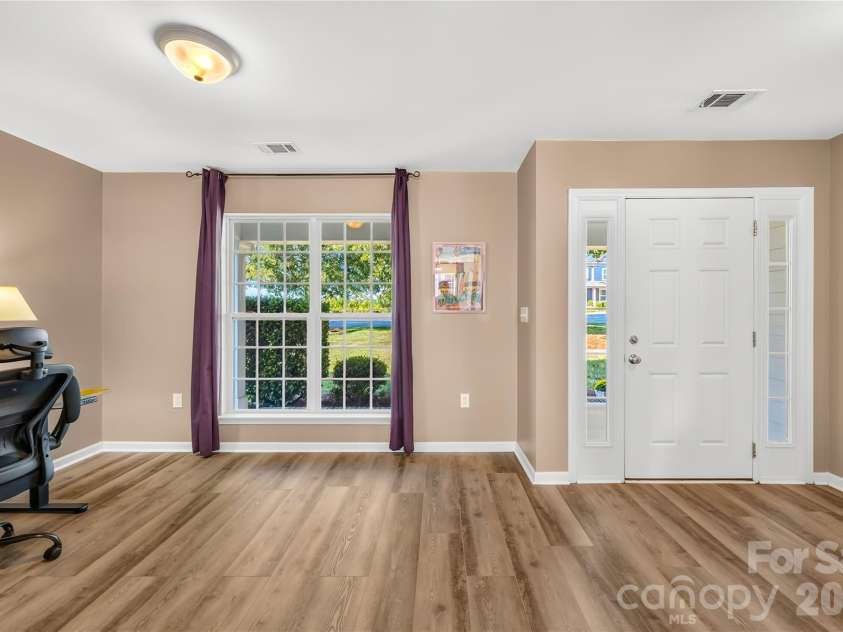 19822 Davidson Concord Road, Davidson, NC 28036.  MLS# CAR4429435, YatesRealty ID 54473. Den or office space
