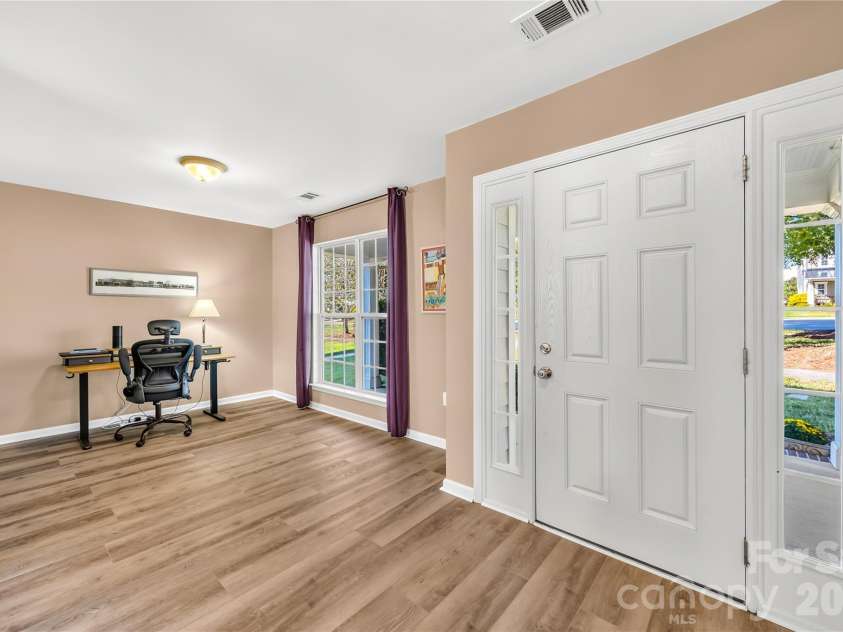 19822 Davidson Concord Road, Davidson, NC 28036.  MLS# CAR4429435, YatesRealty ID 54473. Entrance to front of home