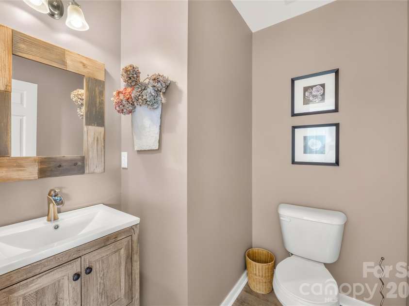 19822 Davidson Concord Road, Davidson, NC 28036.  MLS# CAR4429435, YatesRealty ID 54473. Half bathroom main level