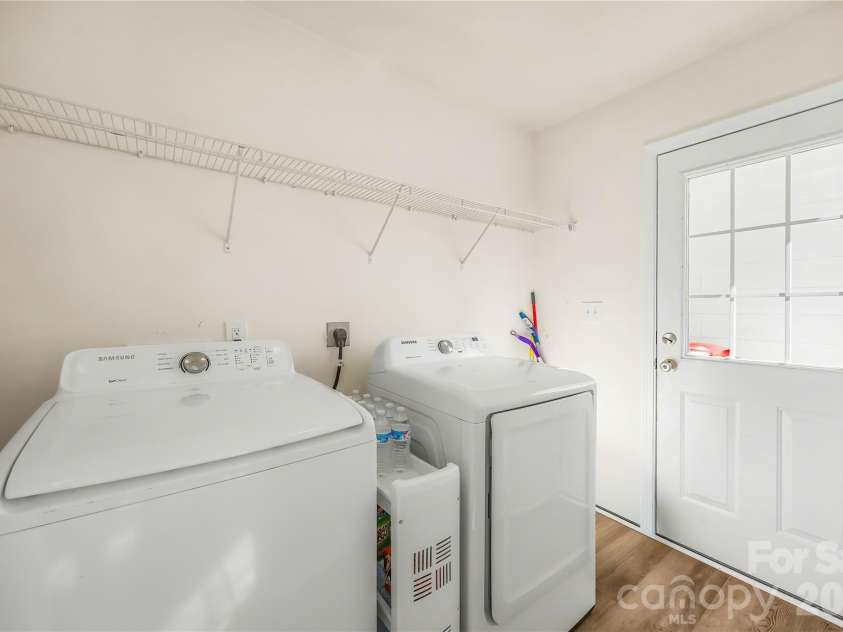 19822 Davidson Concord Road, Davidson, NC 28036.  MLS# CAR4429435, YatesRealty ID 54473. Laundry Room with separate entrance/exit